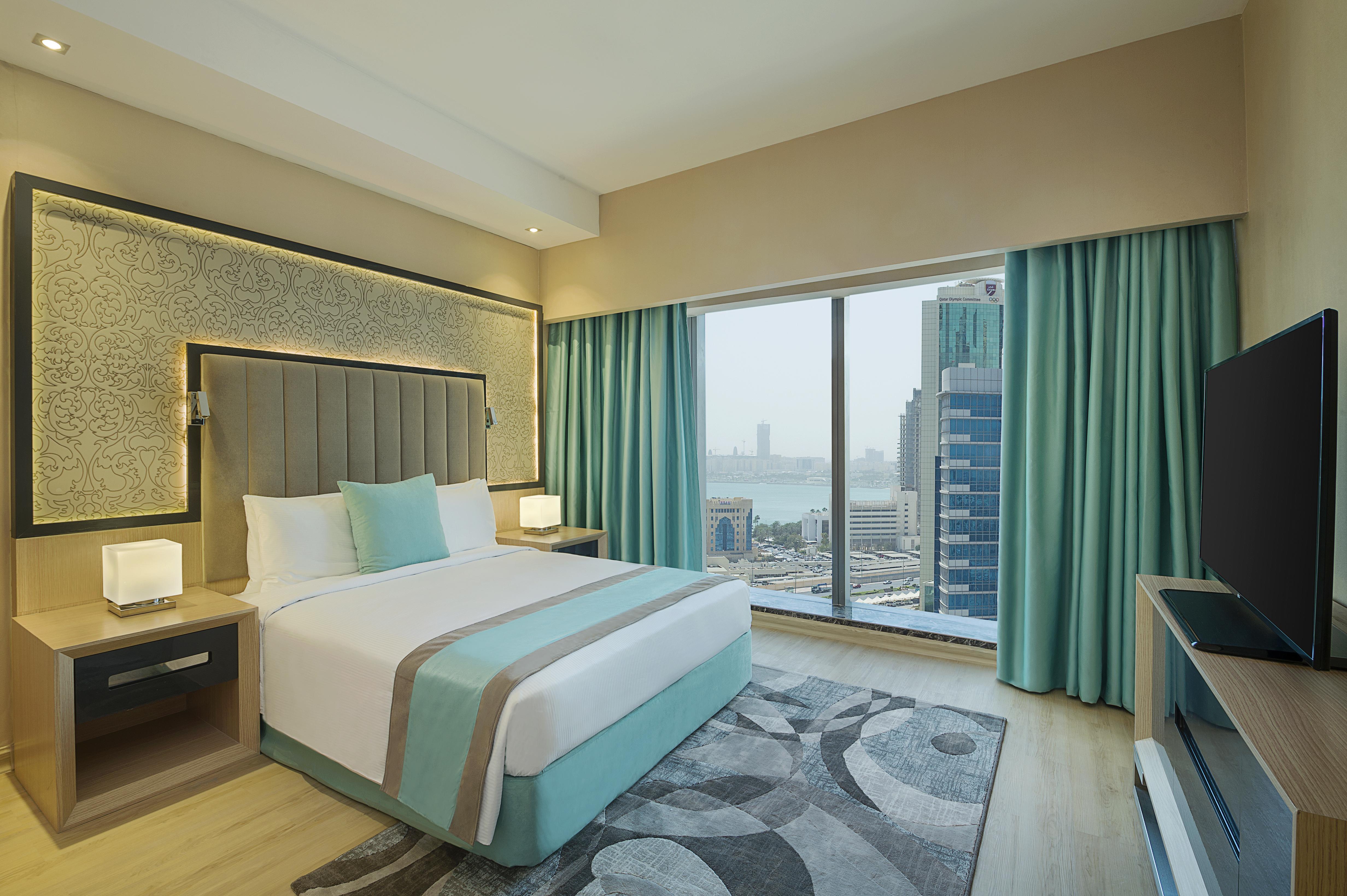 Wyndham Doha West Bay Hotell Eksteriør bilde A bedroom at the hotel