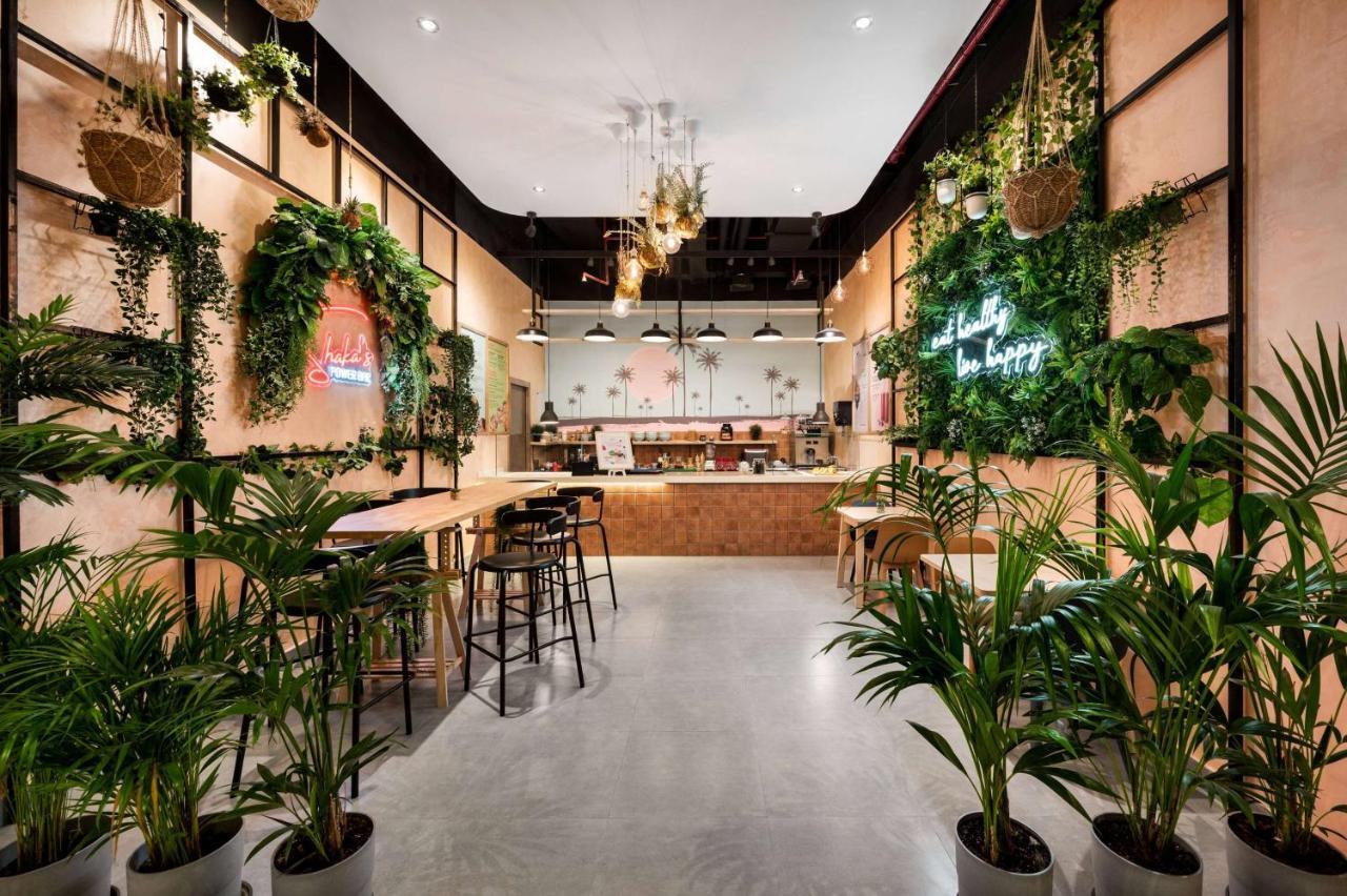 Wyndham Doha West Bay Hotell Eksteriør bilde The interior of a Starbucks Reserve store in Shanghai, China