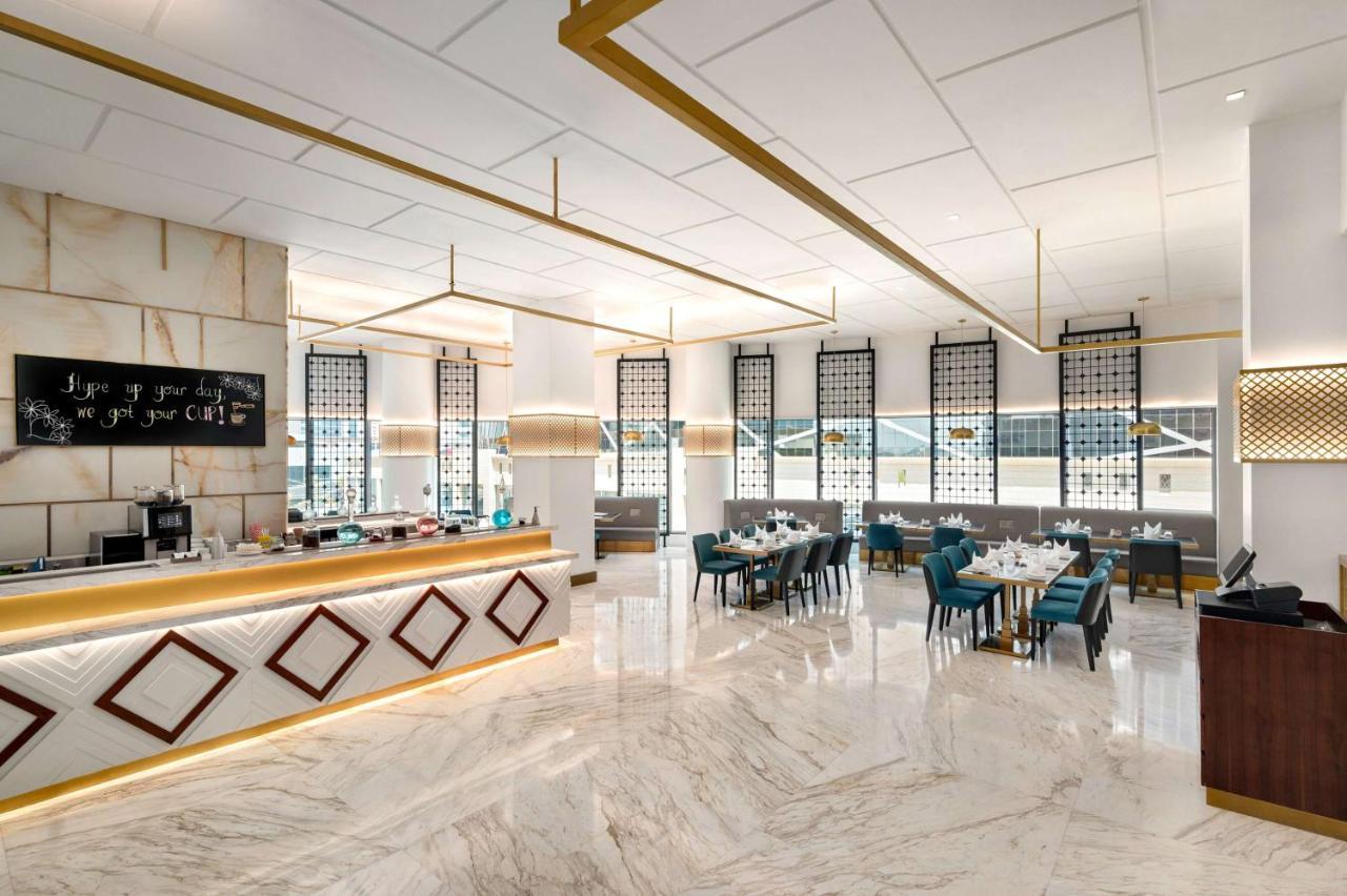 Wyndham Doha West Bay Hotell Eksteriør bilde 3D rendering of a restaurant