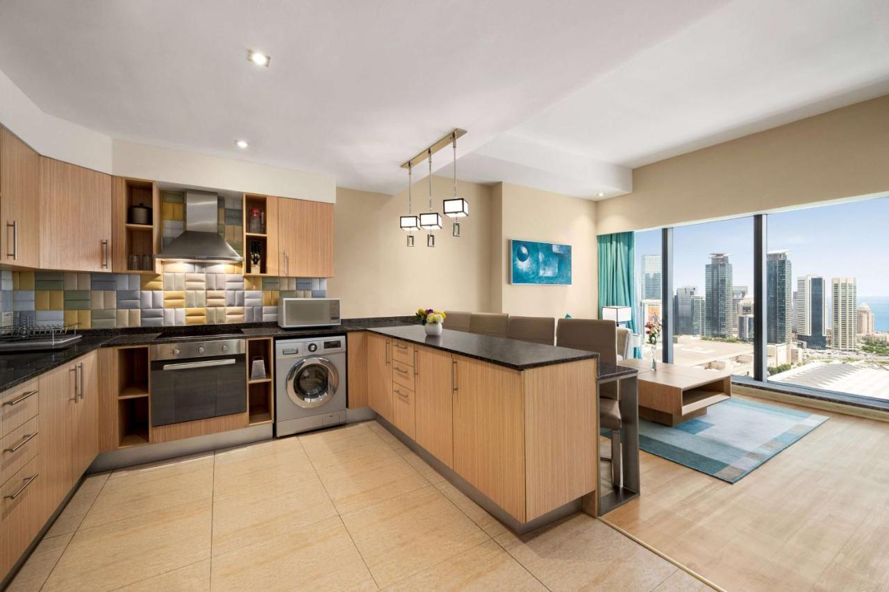 Wyndham Doha West Bay Hotell Eksteriør bilde A typical apartment interior