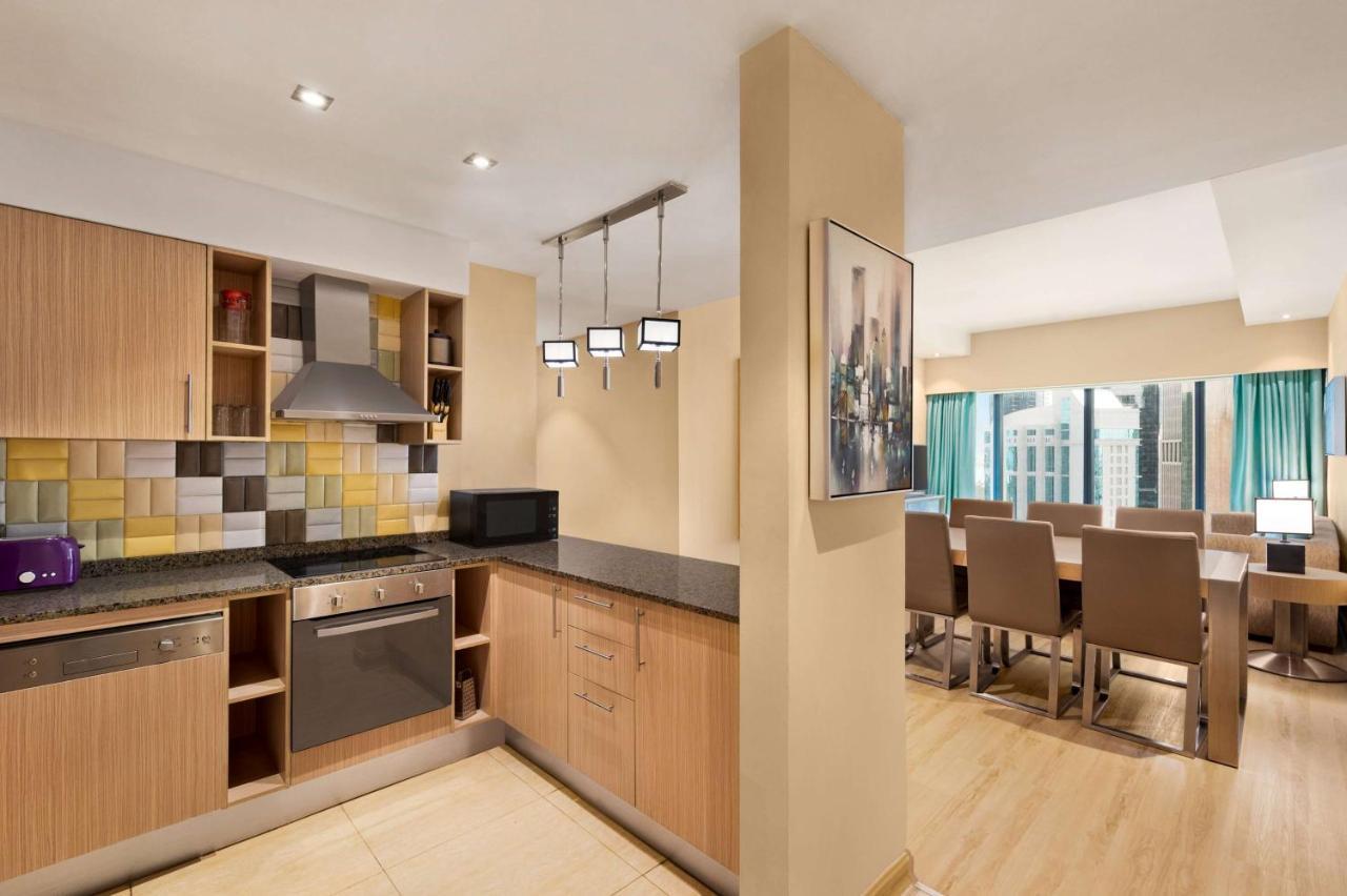 Wyndham Doha West Bay Hotell Eksteriør bilde A typical apartment interior
